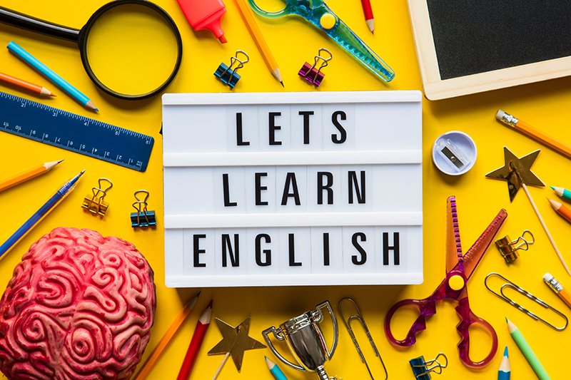 Lets learn english lightbox message on a bright yellow backgroun